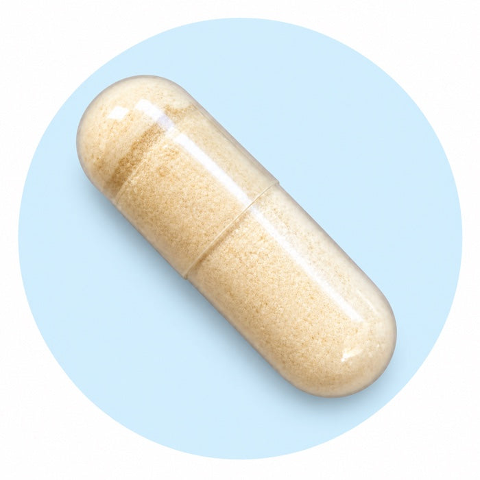 One Holy Cow capsule against a pale-blue circle